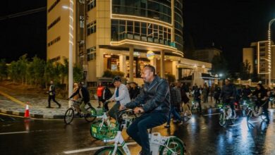 Prime Minister Abiy Ahmed riding bike at corridor development projects in Addis Piassa and Arat Kilo